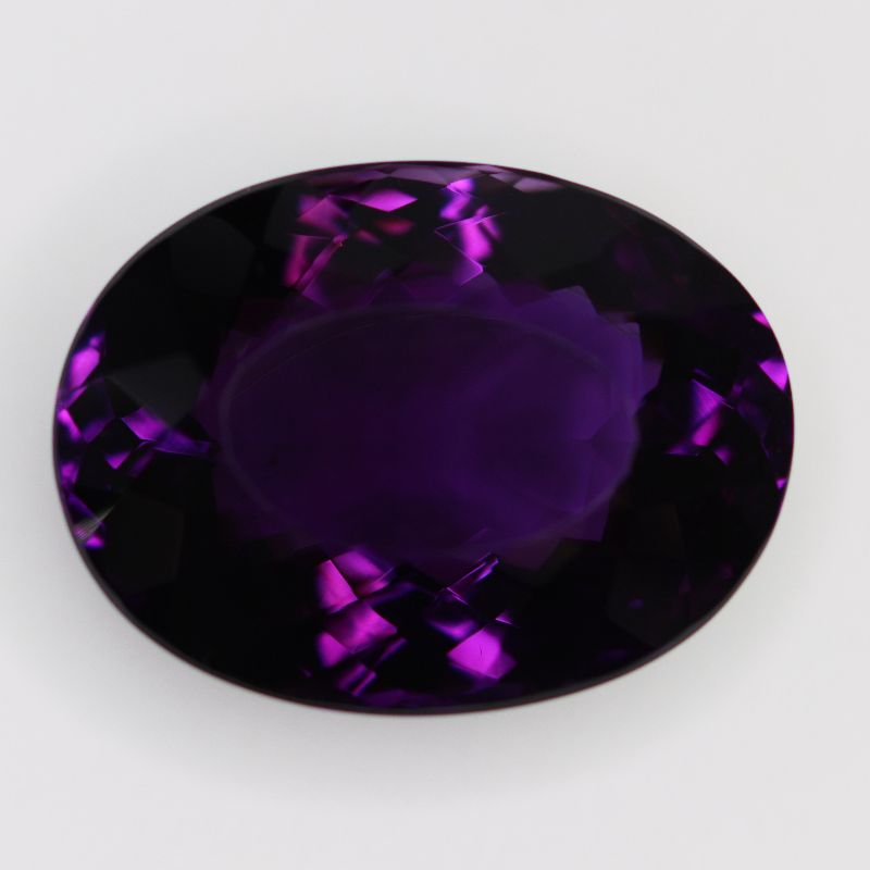 AMETHYST DARK 31.8X23.8 FACETED OVAL 64.72CT