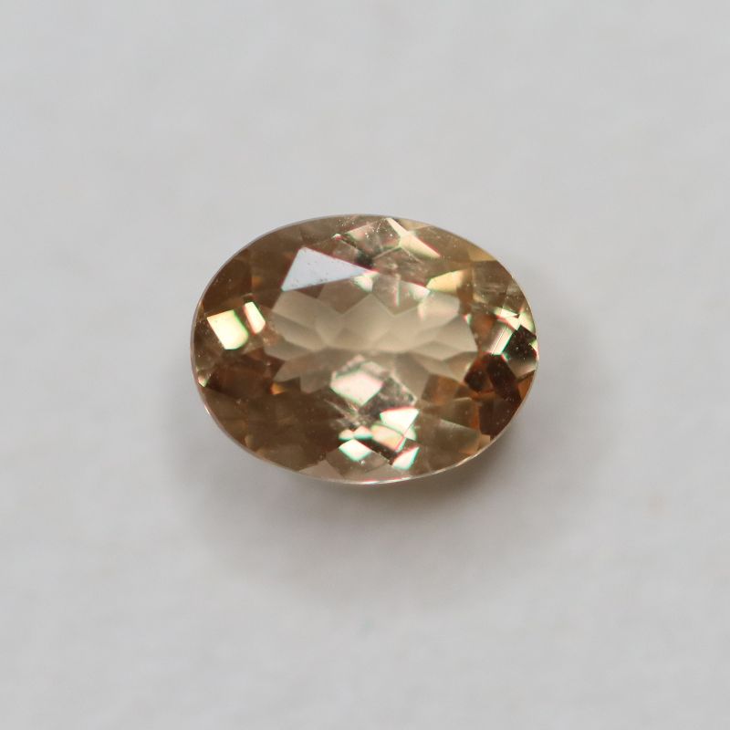 PRECIOUS TOPAZ 6.3X4.9 OVAL FACETED