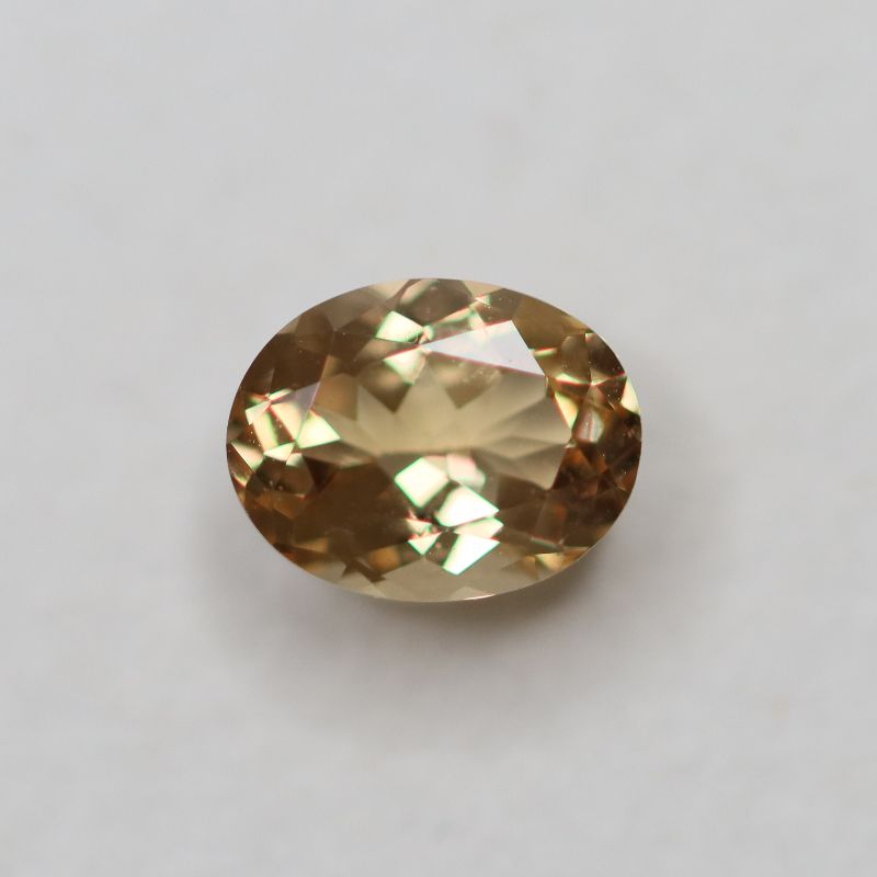 PRECIOUS TOPAZ 6.6X5.2 OVAL FACETED