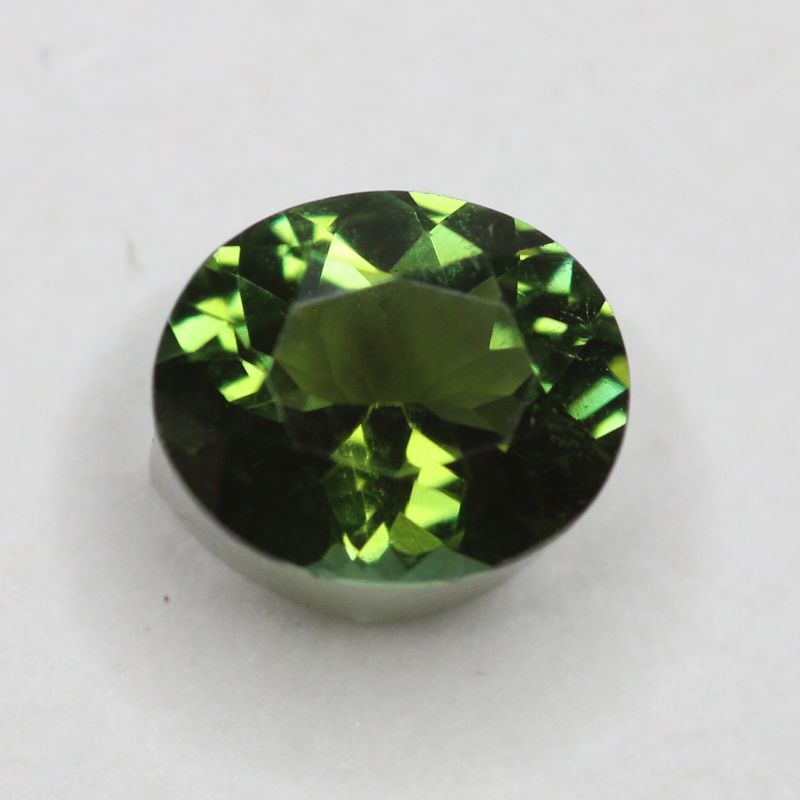 GREEN TOURMALINE 7.7X6.5 OVAL FACETED