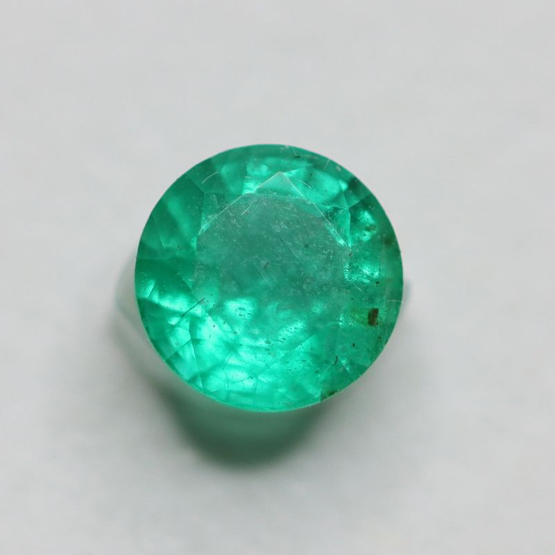 EMERALD 4.8MM FACETED ROUND 0.52CT