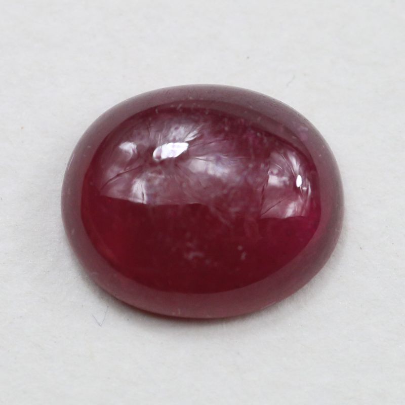 GLASS FILLED RUBY 12X10.1 OVAL CABOCHON