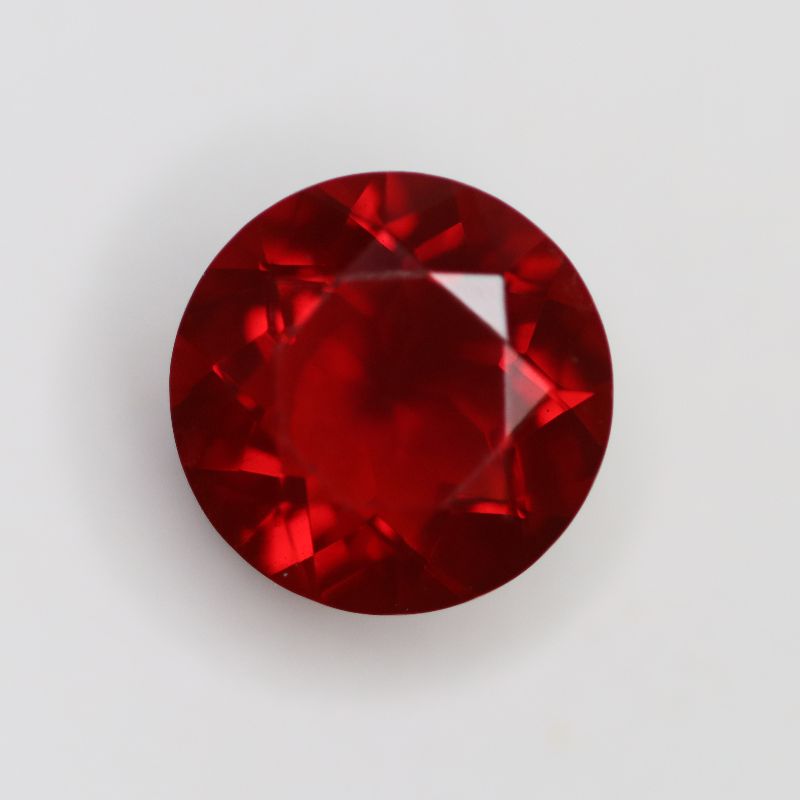 FIRE OPAL 8.4MM ROUND FACETED