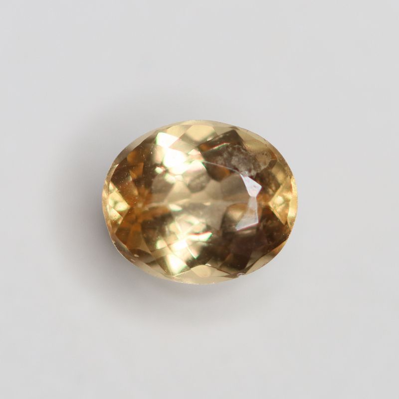 PRECIOUS TOPAZ 6.2X5.2 OVAL FACETED