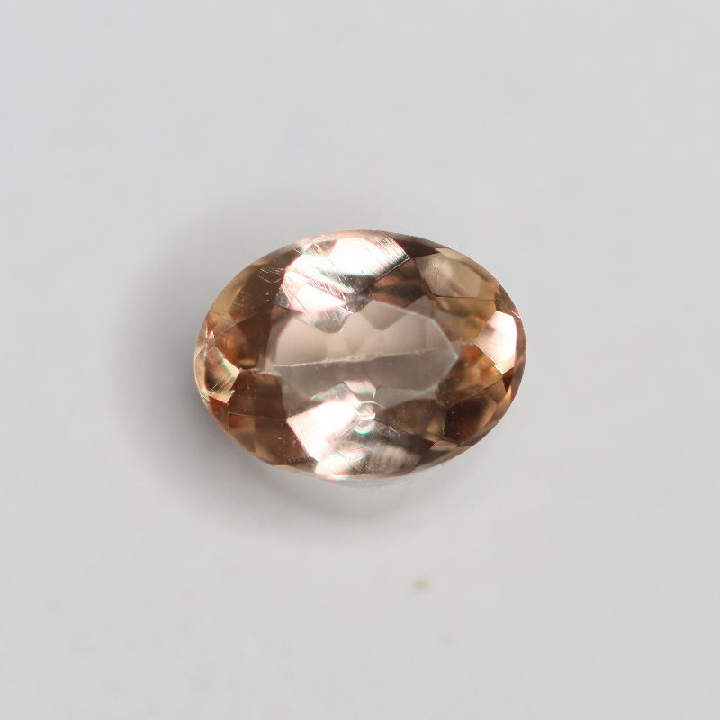 PRECIOUS TOPAZ 6.2X4.7 OVAL FACETED