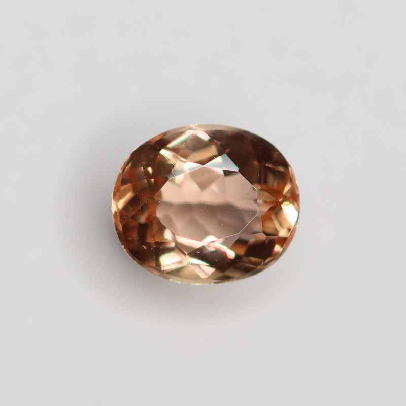 PRECIOUS TOPAZ 6.8X5.8 OVAL FACETED