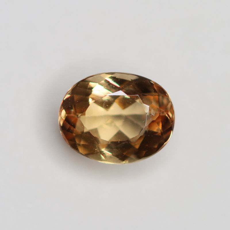PRECIOUS TOPAZ 7.2X5.6 OVAL FACETED
