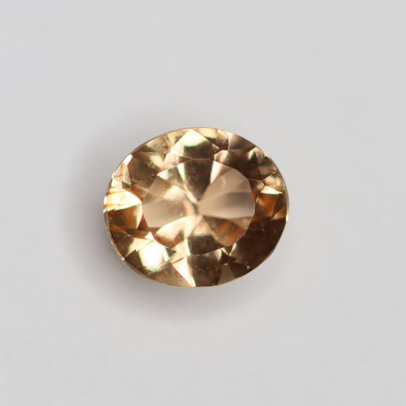 PRECIOUS TOPAZ 6.9X6 OVAL FACETED