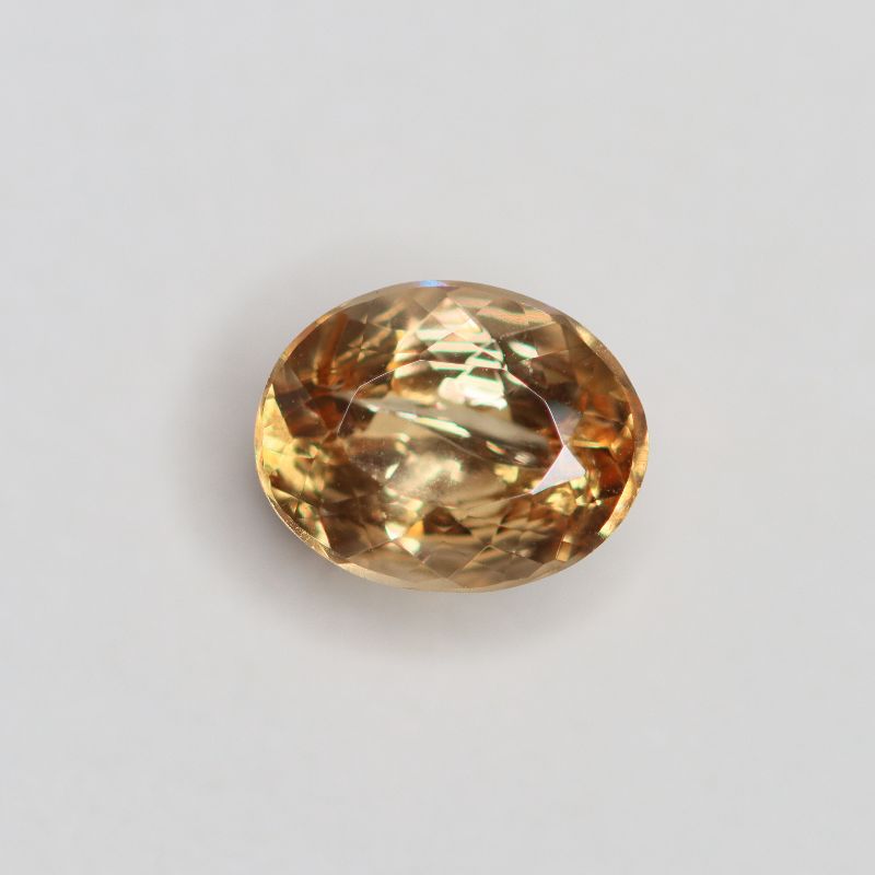 PRECIOUS TOPAZ 7.4X5.8 OVAL FACETED