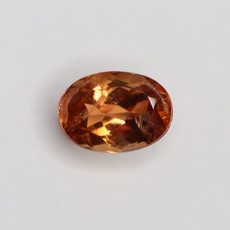 PRECIOUS TOPAZ 6.9X4.9 OVAL FACETED