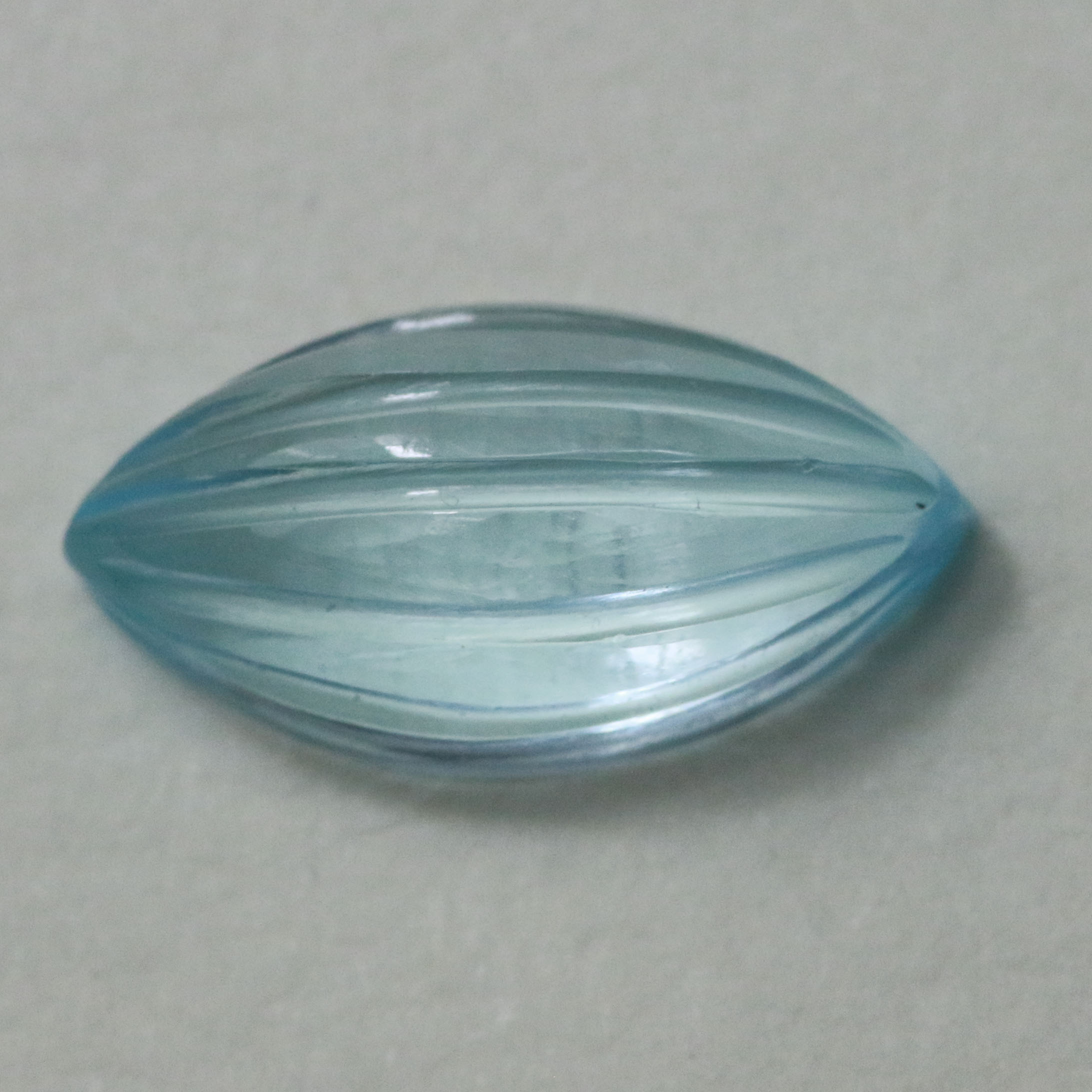 BLUE TOPAZ 14X7 FANCY CARVED MARQUISE 