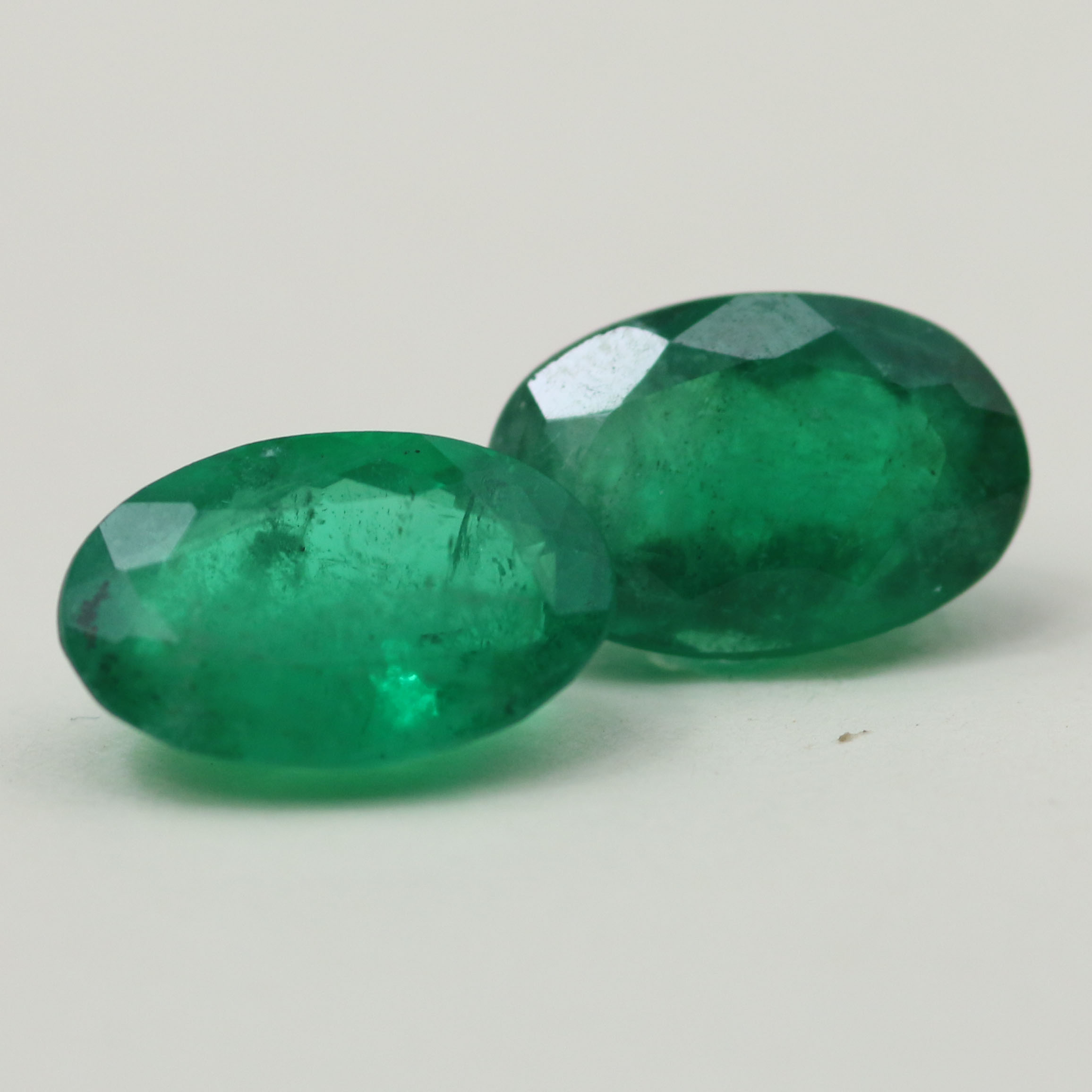 EMERALD PAIR 10X6.8 OVAL 3.74CT