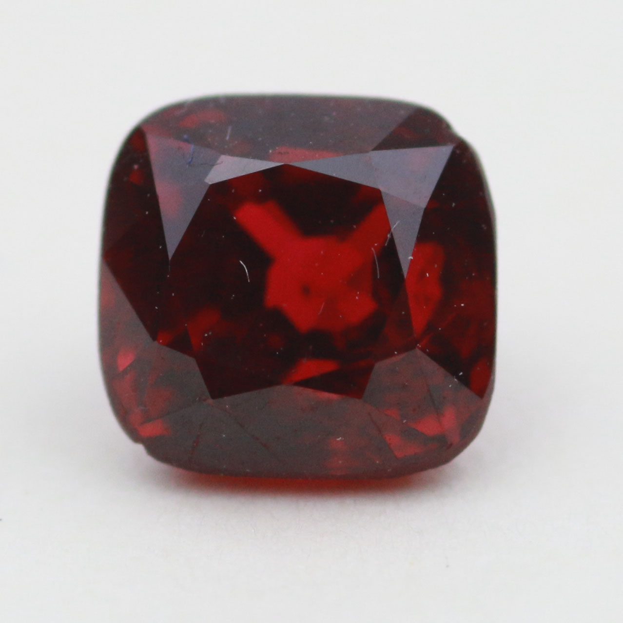 5.7X5.7 RED SPINEL CUSHION 1.28CT