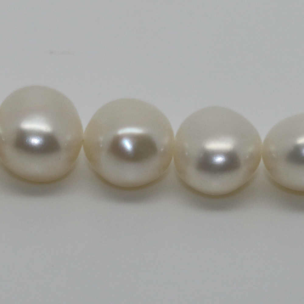 7/7.5MM FRESHWATER OFF ROUND/POTATO C/PEARL STRINGS