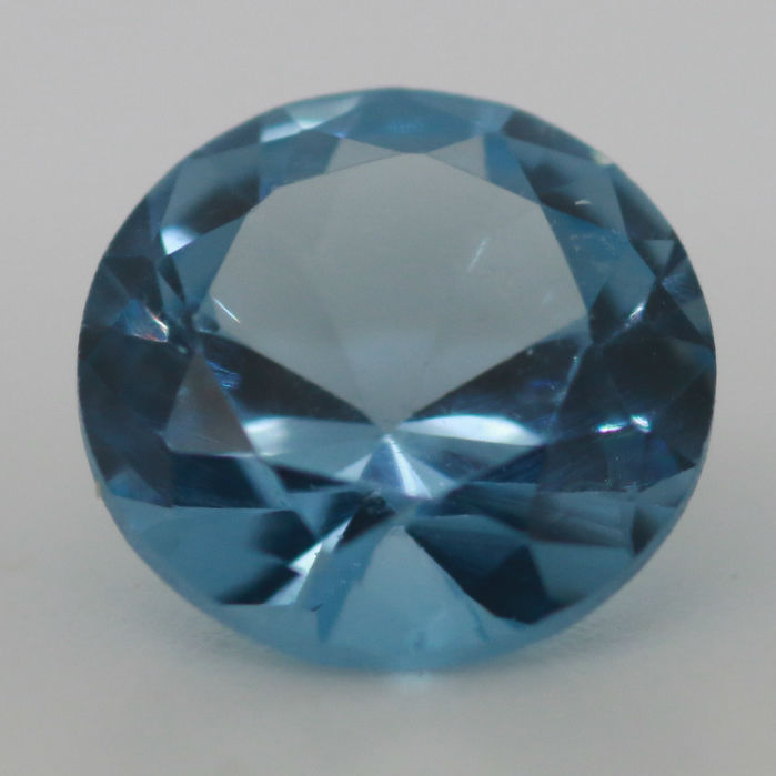 7.5MM ROUND SYNTHETIC AQUA SPINEL 