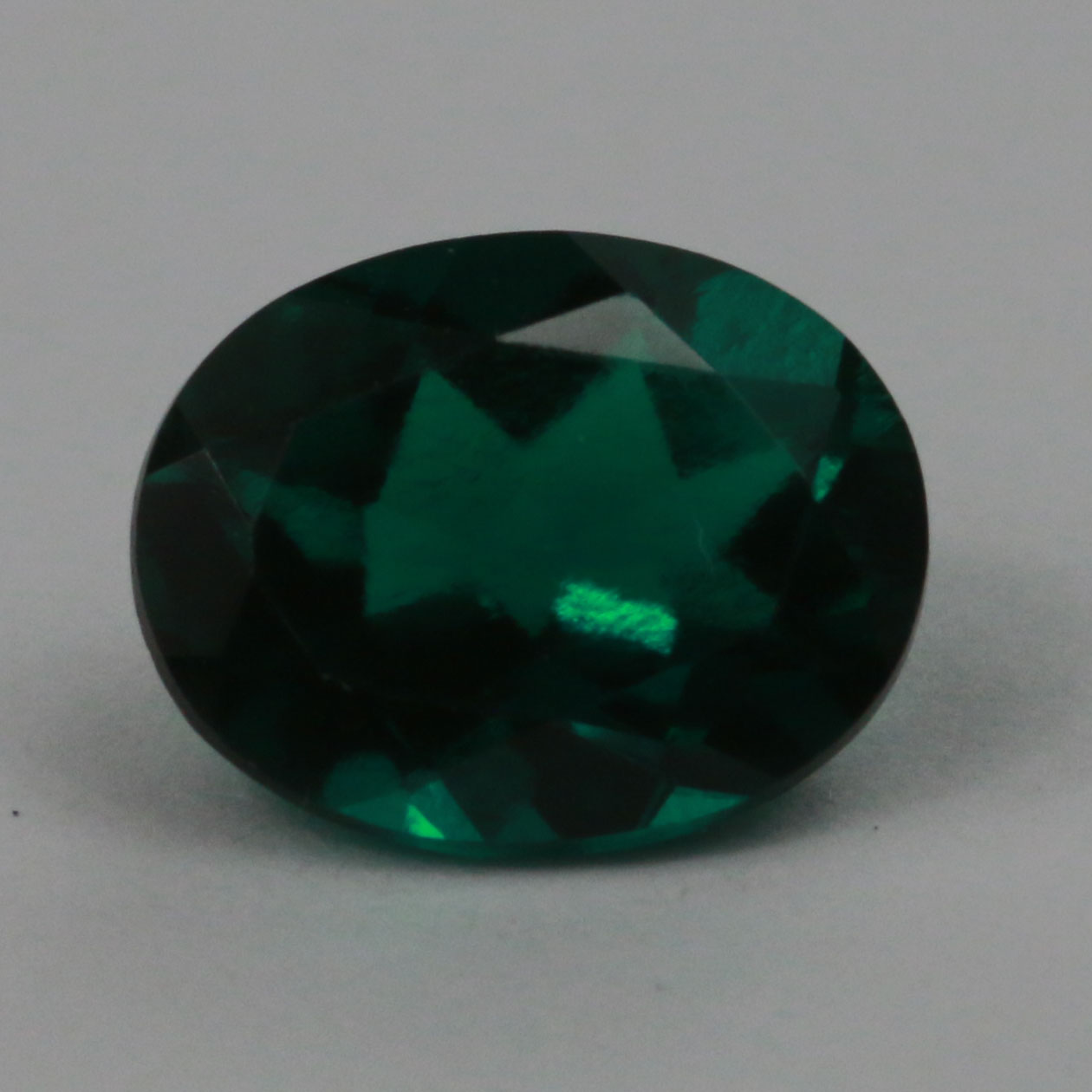 8X6 OVAL SYNTHETIC HYDRO THERMAL EMERALD